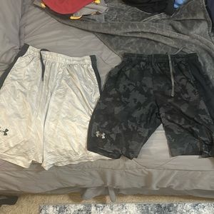 TWO PAIRS UNDER ARMOUR MENS SHORTS